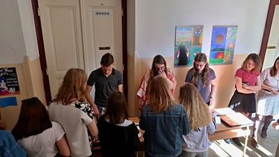 Image may contain: 1 person, sitting and indoor